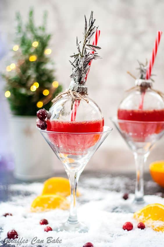 Holiday gin and tonic served on christmas ball ornaments