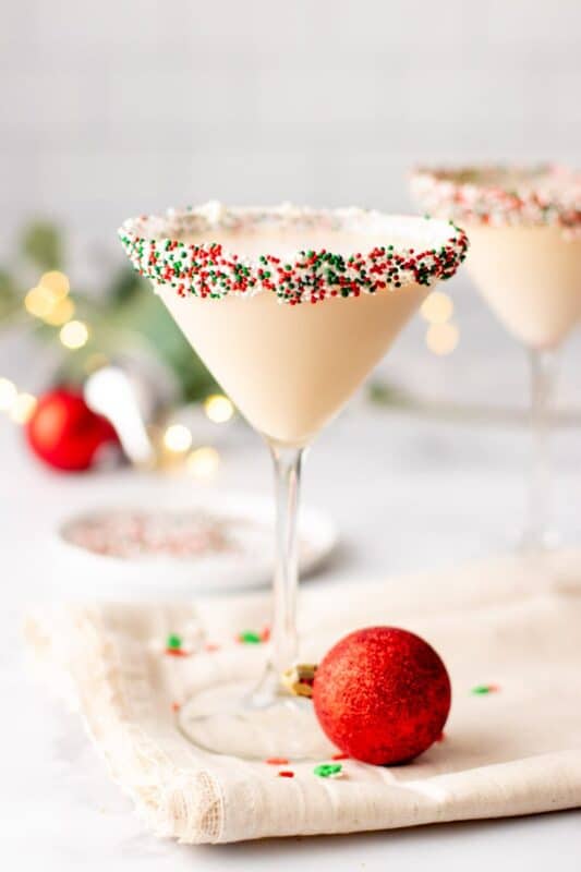 A Sugar Cookie Martini is a festive Christmas cocktail that tastes like a delicious Christmas cookie with a kick! Serve these at your next holiday party.