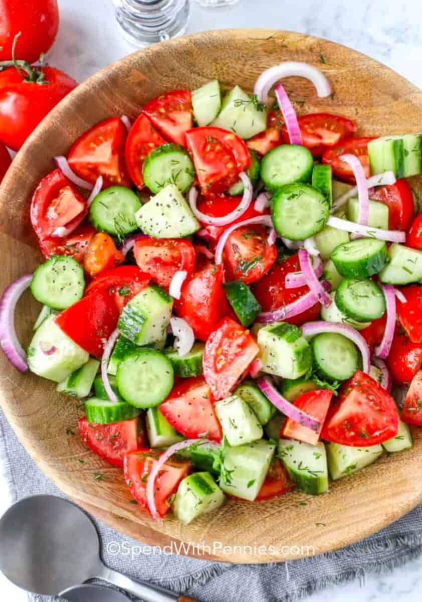 Cucumber Tomato Salad in a wooden bowl.