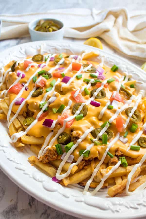 Cheesy fries recipe for tailgating, perfect for game day.
