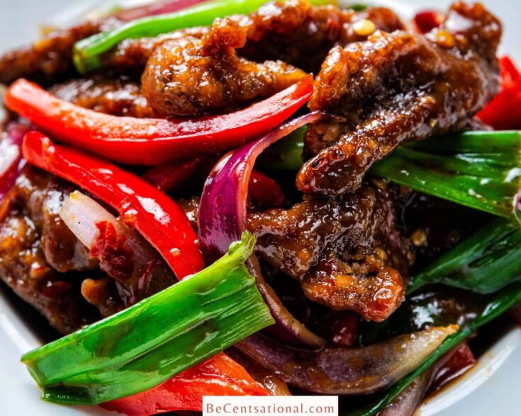Best P.F. Chang’s Copycat Recipes showcasing Mongolian beef with red peepers and scallions.