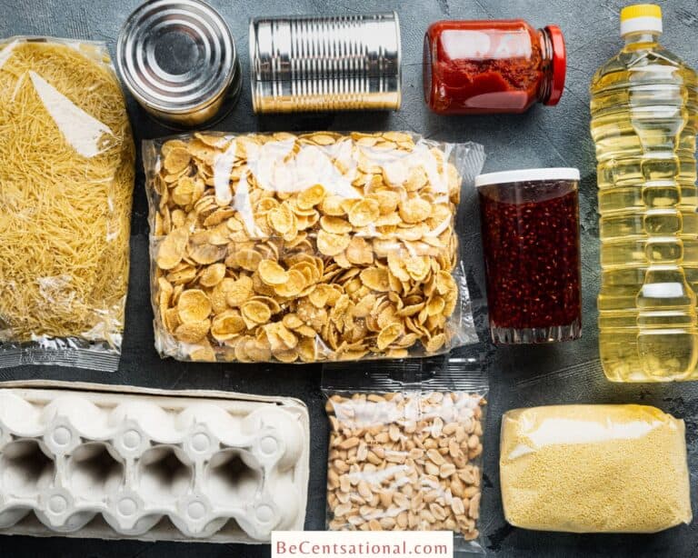 Top view of foods such as cereals, canned vegetable, preserves, oils, pastas and dry legumes for stockpiling for an emergency.