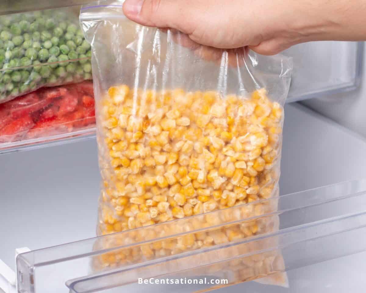 Closeup of a bag of frozen corn in the freezer. Does Frozen Corn Go Bad?