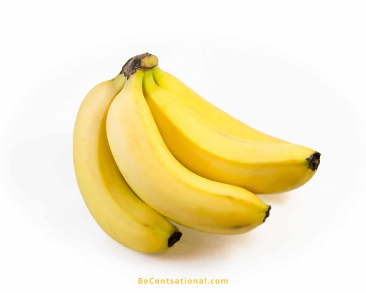 Bananas on a white background. Foods that are yellow.