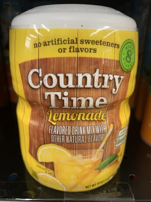 A jar of Country time lemonade powder.
