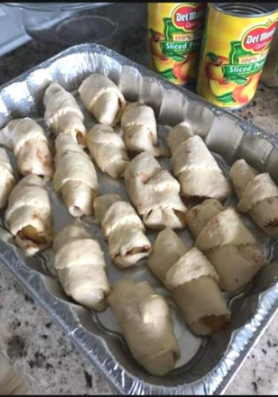 crescent rolls stuffed with apples ready for the oven.