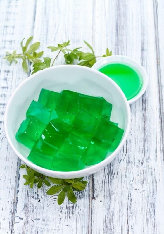 Lime jello in a bowl.