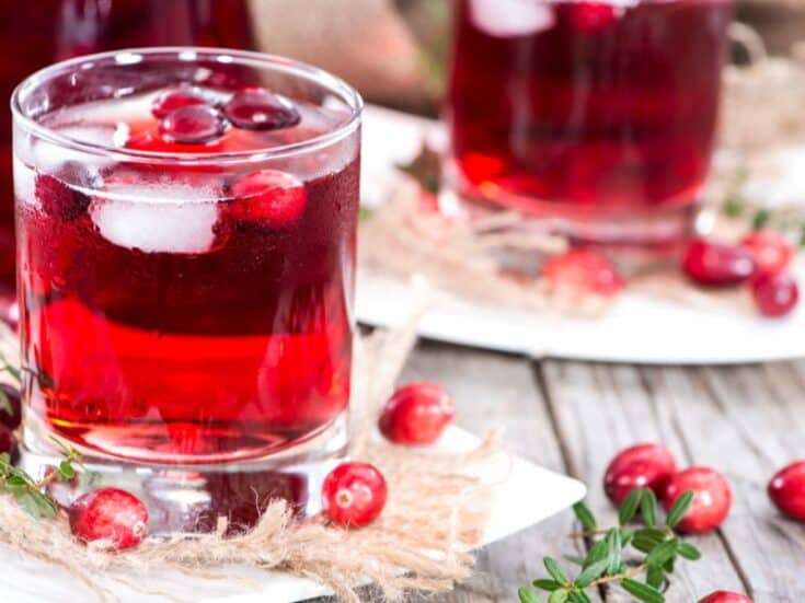 Two glasses of cranberry juice on a table. Does Frozen Cranberry Juice Concentrate Expire?