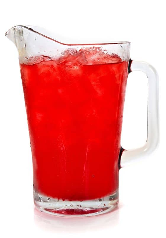 Pitcher of fruit punch on white background. Does fruit punch concentrate expire?