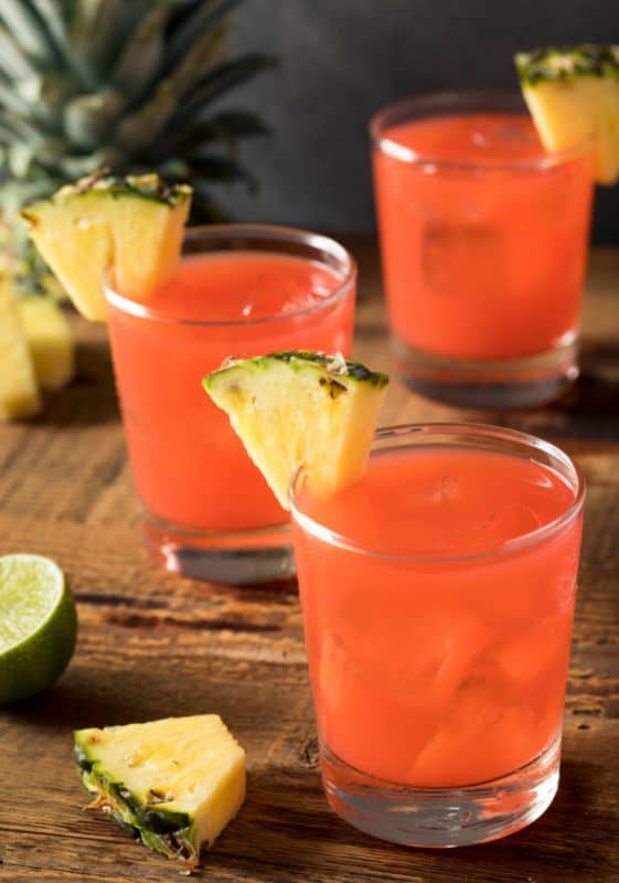 How long does fruit juice last? 3 glasses of hawaiian punch garnished with pineapple.