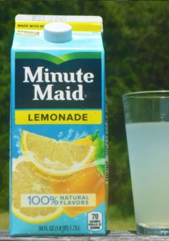 A carton of minute maid lemonade with a glass of lemonade next to it. does minute maid lemonade expire?