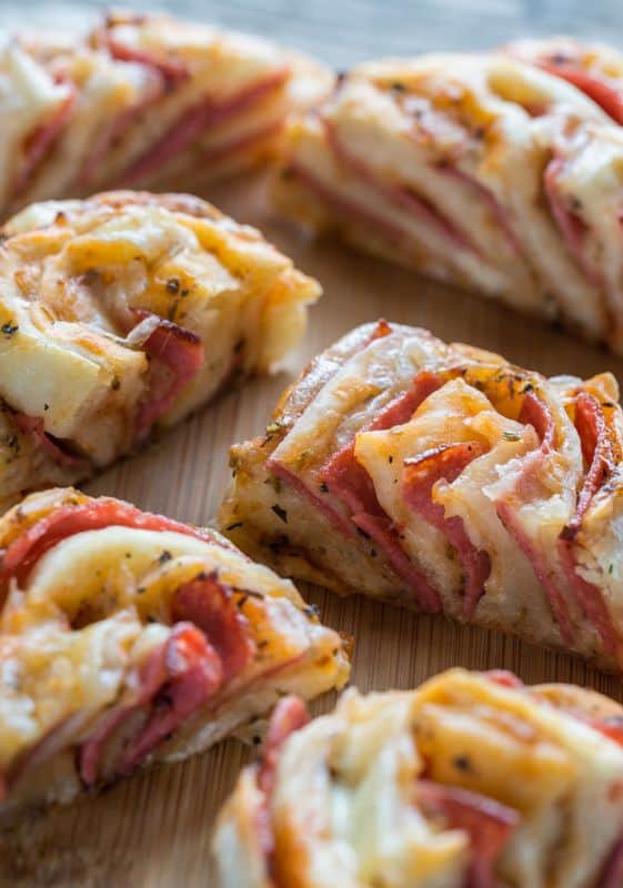Baked Pepperoni Pizza Crescent Rolls in a baking sheet.