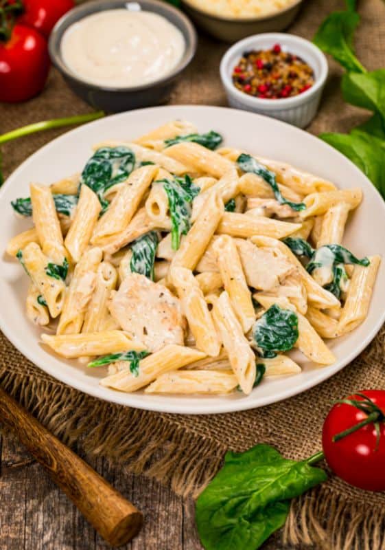 Plate of creamy penne pasta with spinach. Veggie Weight Watchers Recipes. 