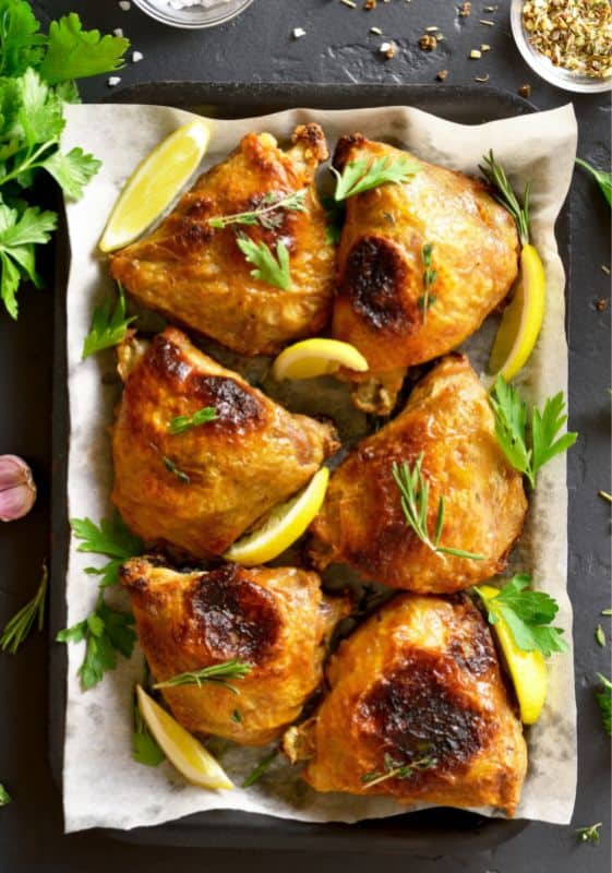 Weight Watchers Air Fryer Recipes, featuring chicken thighs served in a white platter.