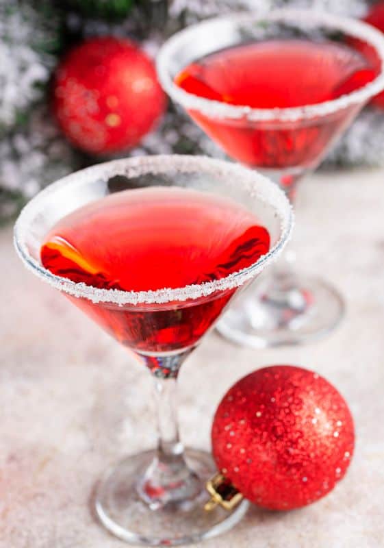 Two Cranberry Kringle Cocktails with sugar-rimmed glasses.