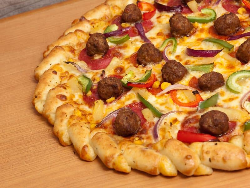 pizza with meatballs.
