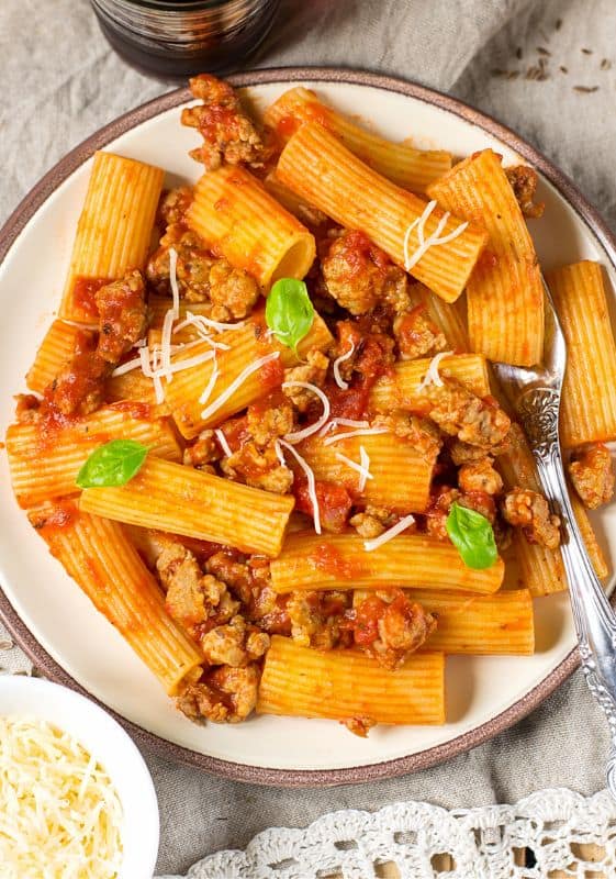 Overhead shot of Rigatoni Bolognese, highlighting the texture of the sauce and the rigatoni.