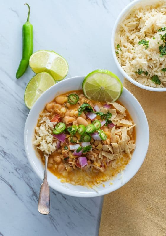 A serving of White Bean Chicken Chili in a rustic bowl, perfect for a cozy meal.
