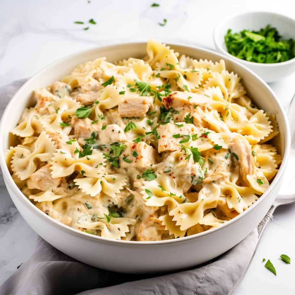 Hearty serving of Chicken Pasta with Buffalo Wild Wings-inspired sauce in a bowl.