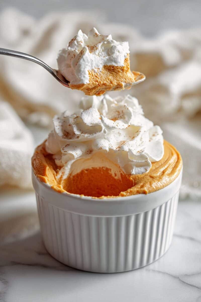 pumpkin fluff pudding spoon closeup.